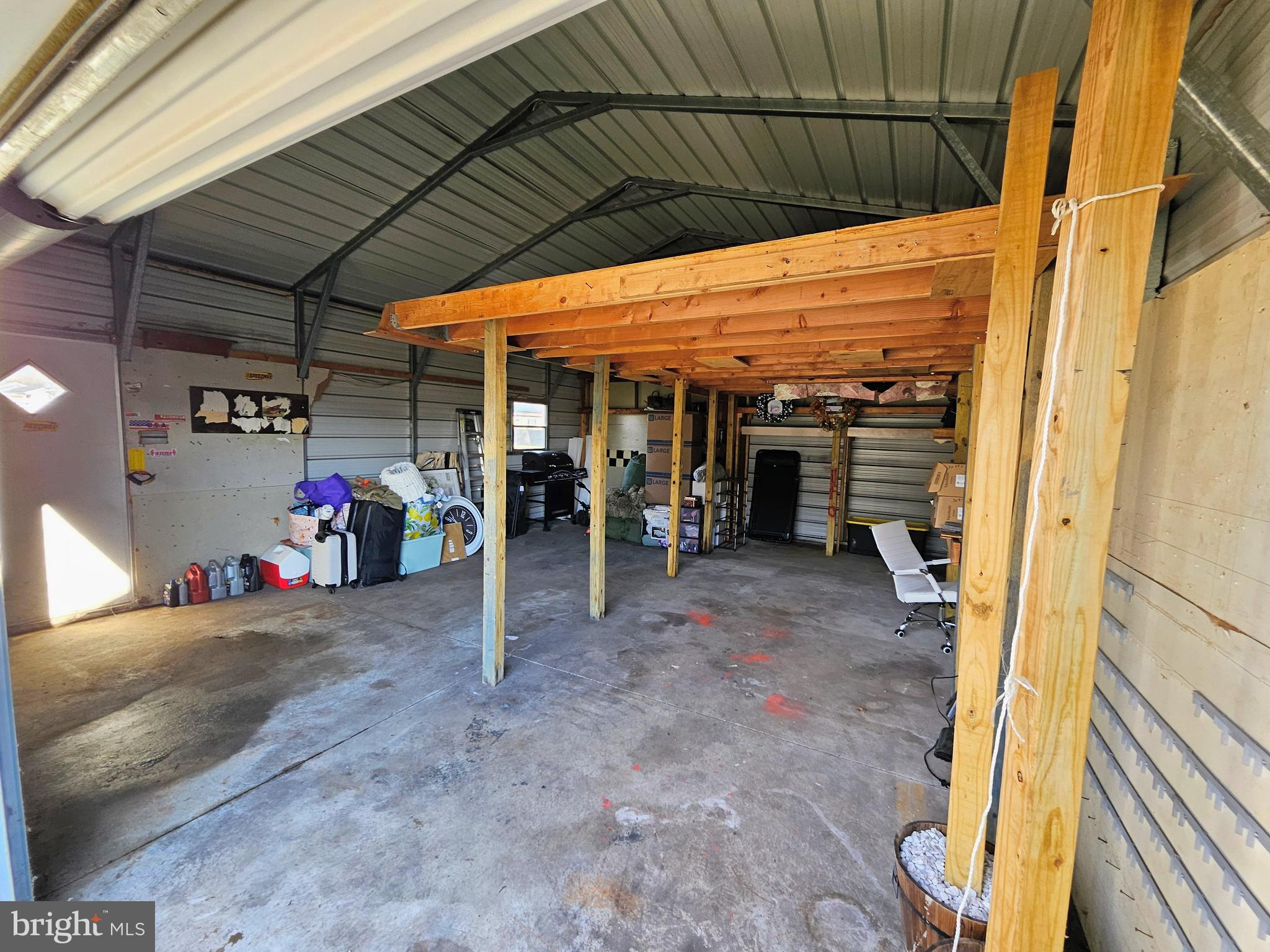 53 Jackson Road Penns Grove, NJ 08069 - Photo 4 of 24 a view of a garage with an outdoor space