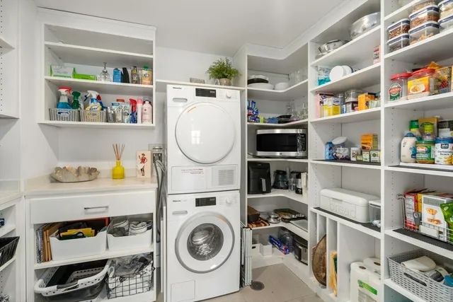a storage room with washer and dryer