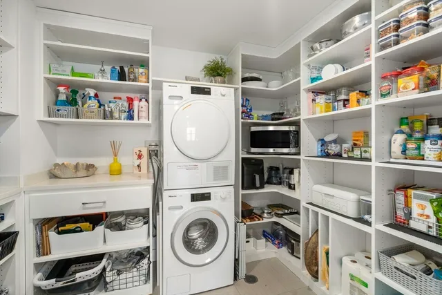 a storage room with washer and dryer