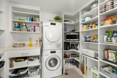 a storage room with washer and dryer