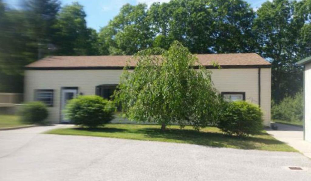 473 Valley View Road Sterling, CT 06377 - Photo 1 of 1 a view of a house with yard and plants
