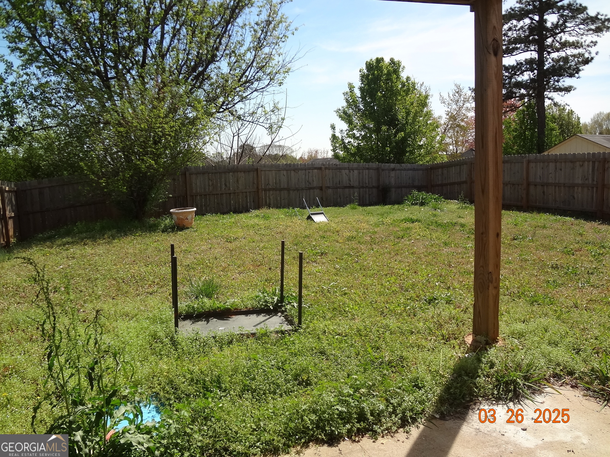 2338 Rambling Way Lithonia, GA 30058 - Photo 15 of 16 a backyard of a house with lots of green space