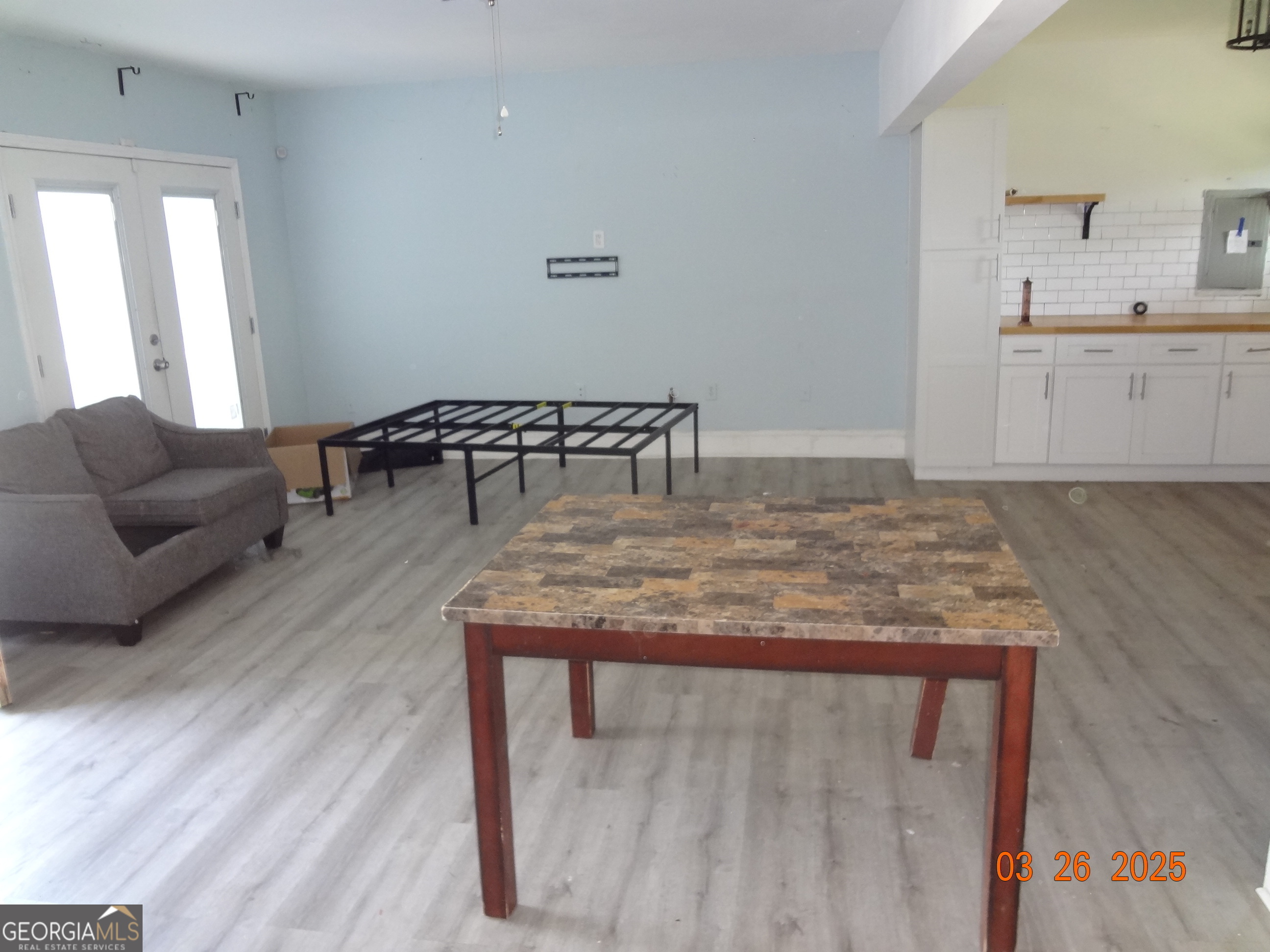 2338 Rambling Way Lithonia, GA 30058 - Photo 3 of 16 a living room with furniture and wooden floor
