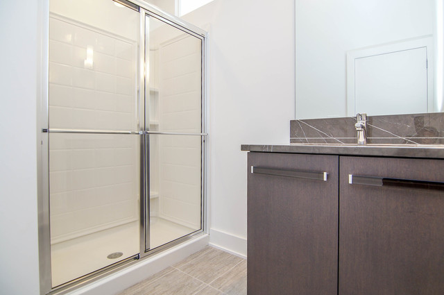 43 Windward Way Ottawa, IL 61350 - Photo 14 of 25 a bathroom with a granite countertop sink and mirror