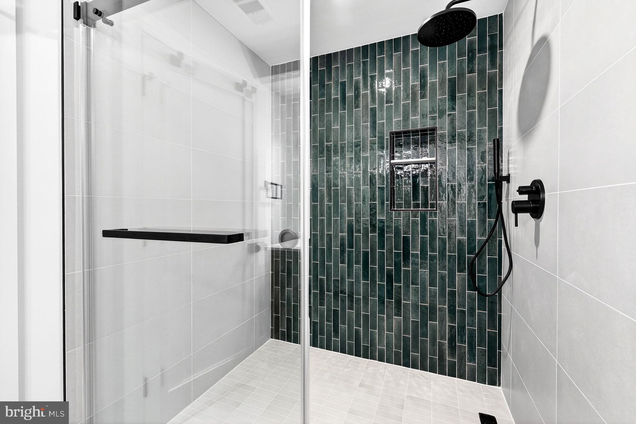 7126 Darby Road Bethesda, MD 20817 - Photo 52 of 84 a bathroom with a shower and a sink