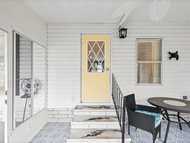 a view of an empty room with a large window