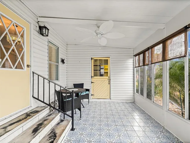 a view of a porch with furniture