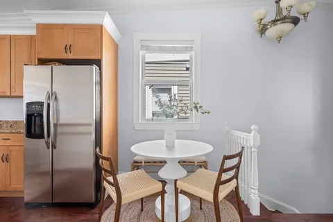a table and chairs in a kitchen