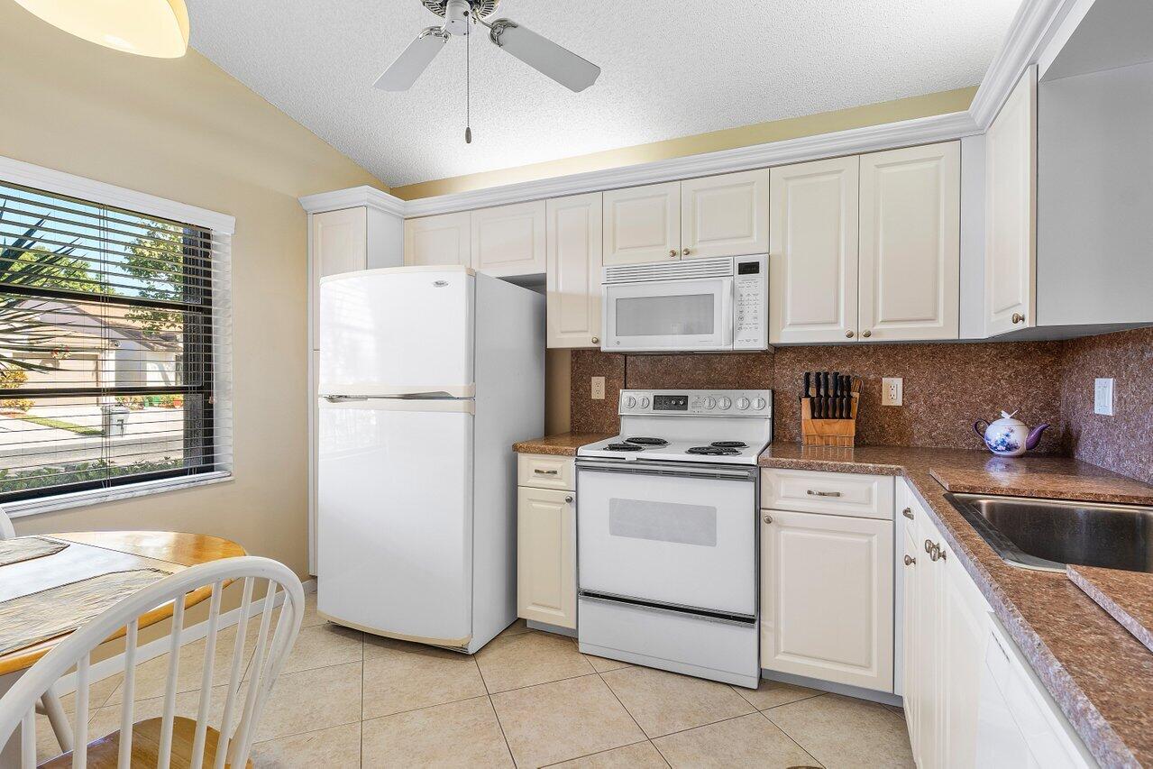 8090 Whispering Palm Drive, Unit A Boca Raton, FL 33496 - Photo 3 of 33 KITCHEN