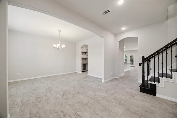 a view of hallway with stairs
