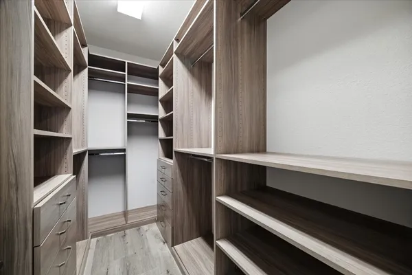 a hallway with cabinets