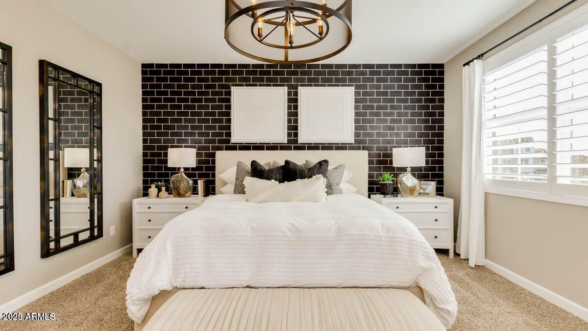 1255 North Arizona Avenue, Unit 1314 Chandler, AZ 85225 - Photo 11 of 23 a bedroom with a bed and a window