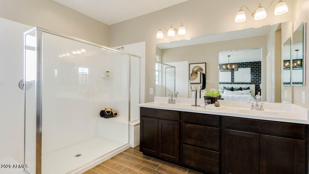 1255 North Arizona Avenue, Unit 1314 Chandler, AZ 85225 - Photo 17 of 23 a bathroom with a double vanity sink mirror and shower