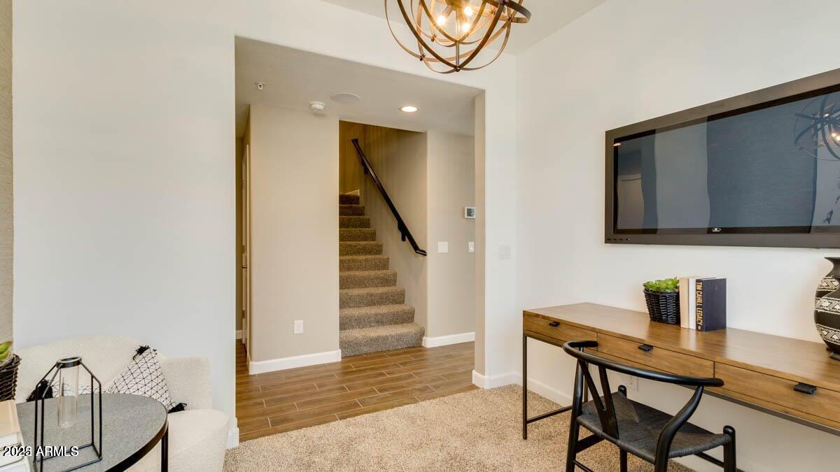 1255 North Arizona Avenue, Unit 1314 Chandler, AZ 85225 - Photo 6 of 23 a view of a hallway with seating area
