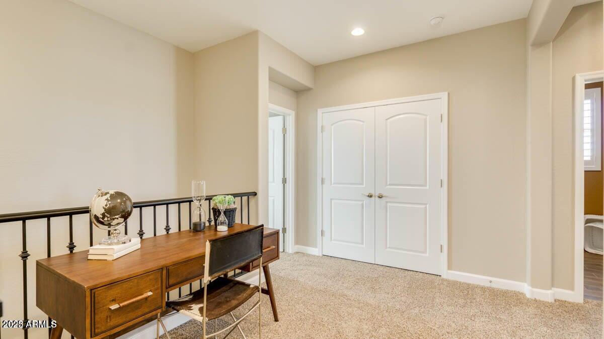 1255 North Arizona Avenue, Unit 1314 Chandler, AZ 85225 - Photo 10 of 23 a view of a bedroom with furniture window and deck