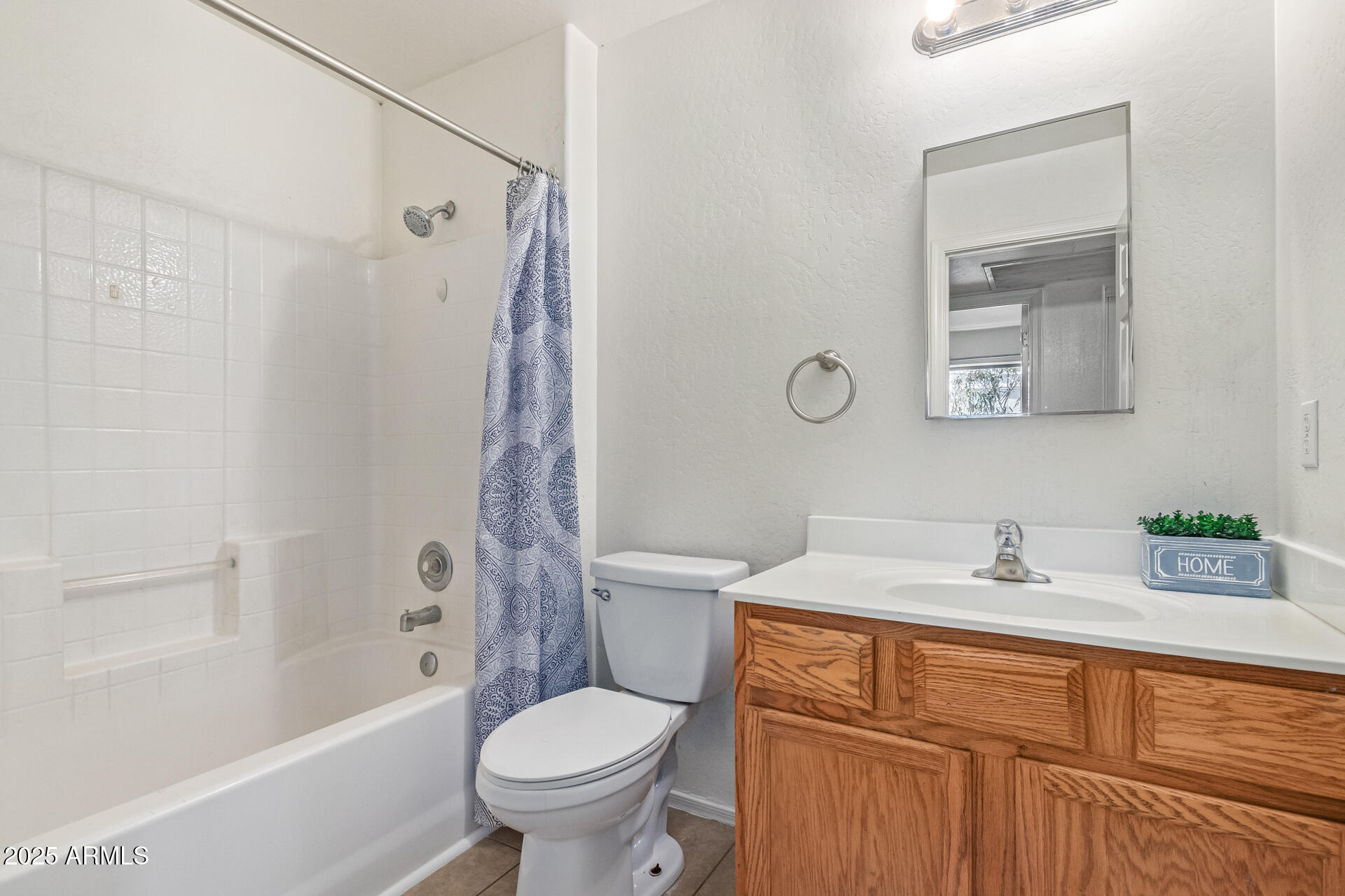 2118 West Adams Street Phoenix, AZ 85009 - Photo 17 of 48 a bathroom with a sink toilet and shower