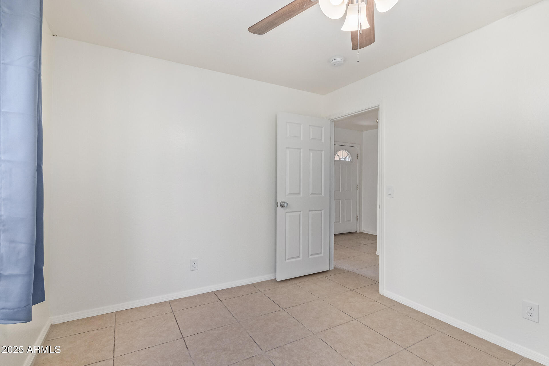 2118 West Adams Street Phoenix, AZ 85009 - Photo 21 of 48 an empty room with a bathroom