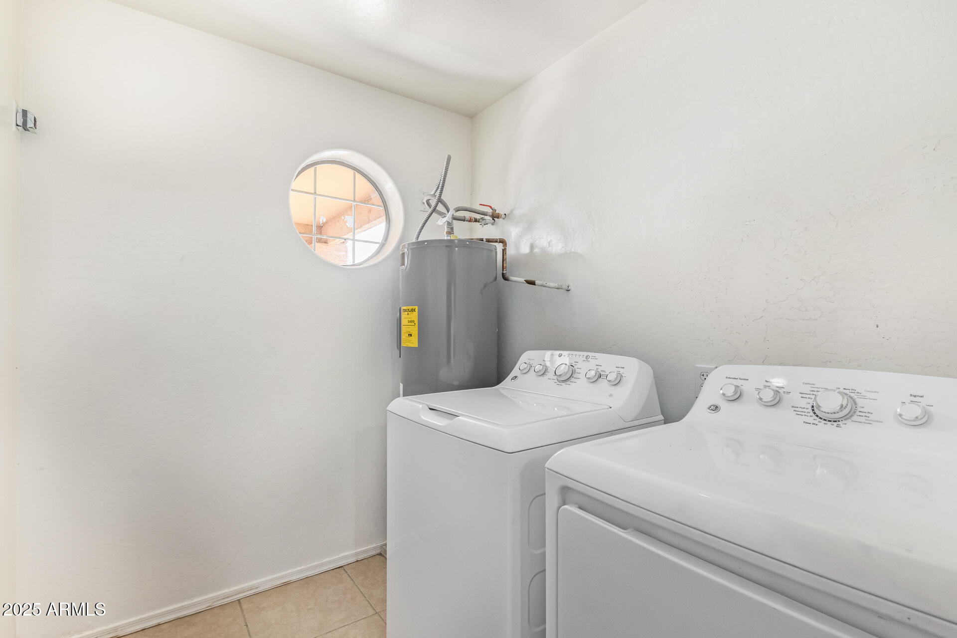 2118 West Adams Street Phoenix, AZ 85009 - Photo 24 of 48 a utility room with dryer and washer