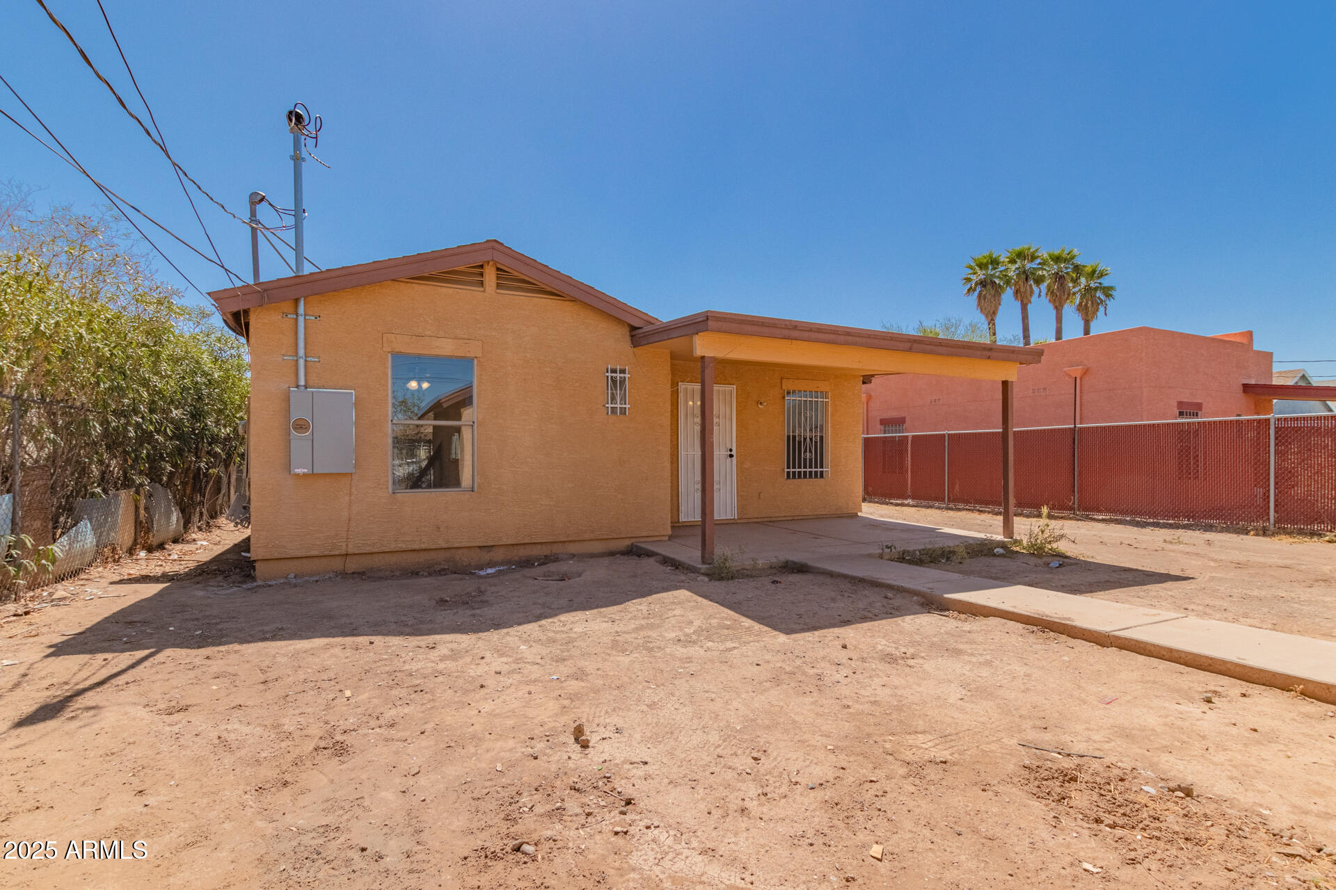 2118 West Adams Street Phoenix, AZ 85009 - Photo 27 of 48 a view of a backyard of a house