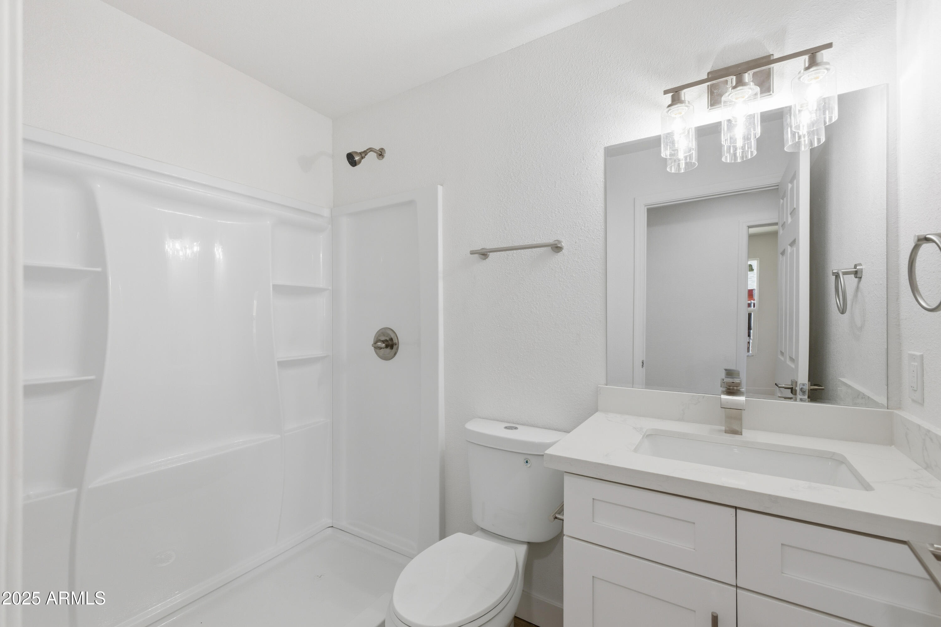 2118 West Adams Street Phoenix, AZ 85009 - Photo 34 of 48 a bathroom with a sink toilet and shower