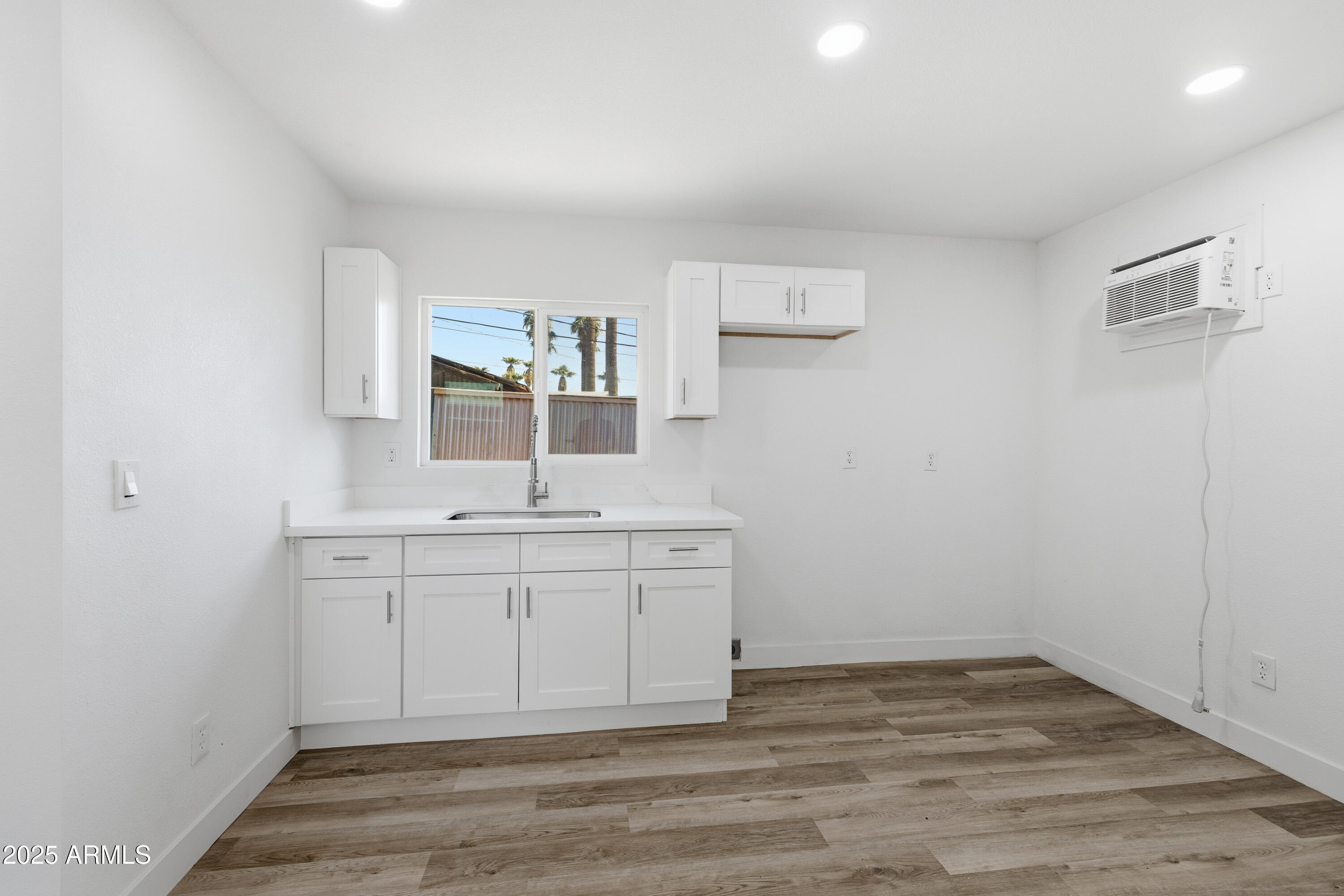 2118 West Adams Street Phoenix, AZ 85009 - Photo 38 of 48 a view of a kitchen with sink and dishwasher