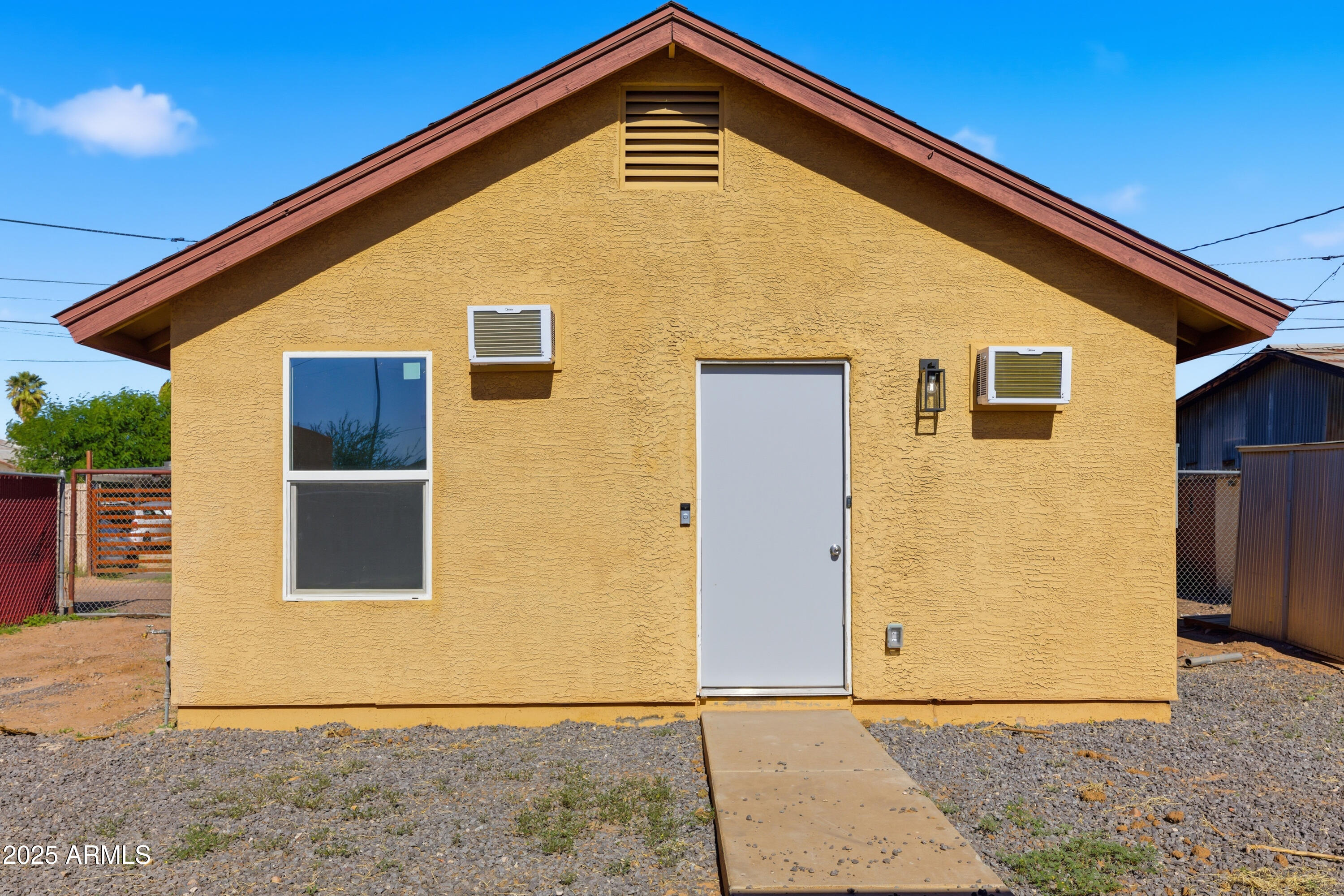 2118 West Adams Street Phoenix, AZ 85009 - Photo 39 of 48 a front view of a house