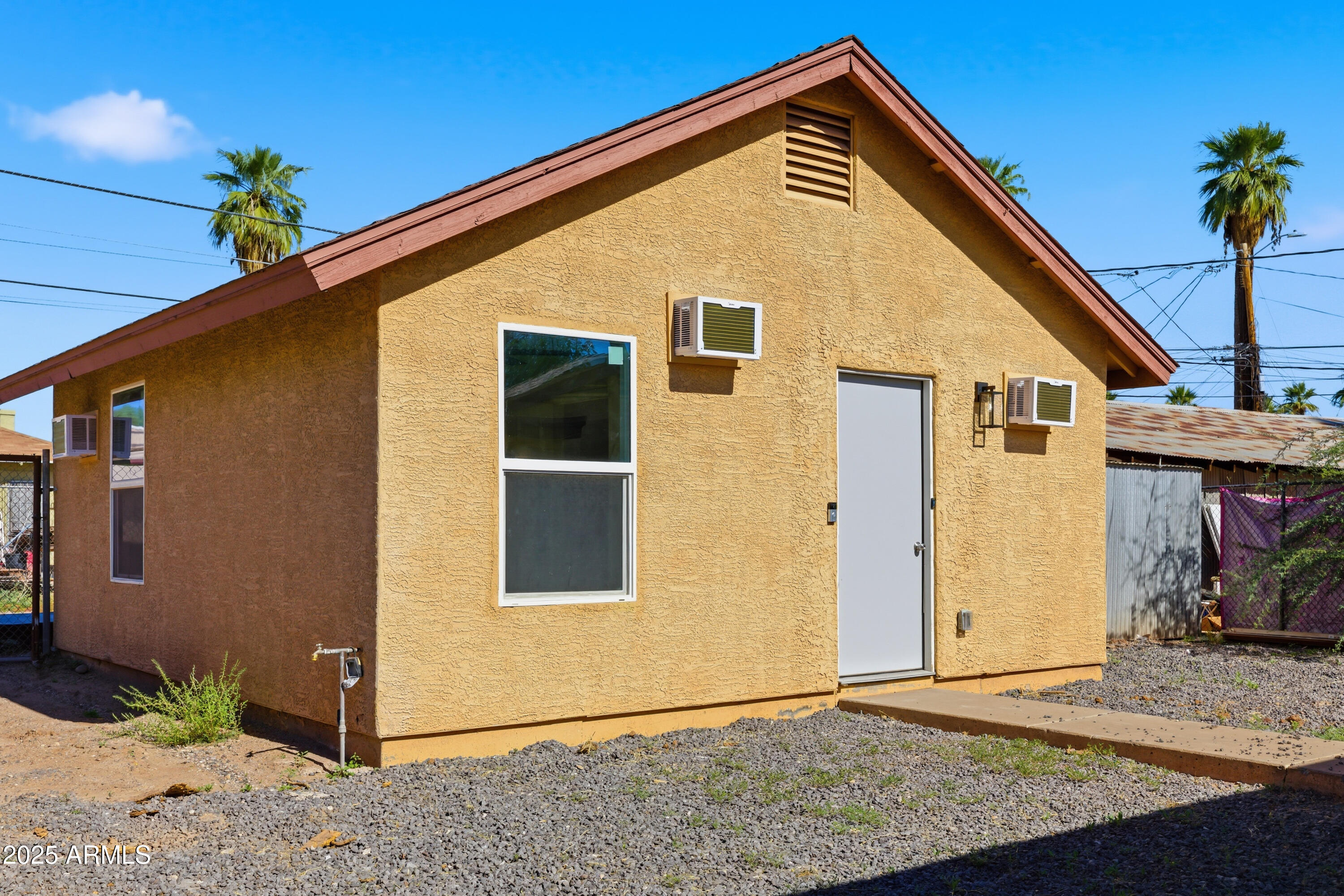 2118 West Adams Street Phoenix, AZ 85009 - Photo 40 of 48 a front view of a house