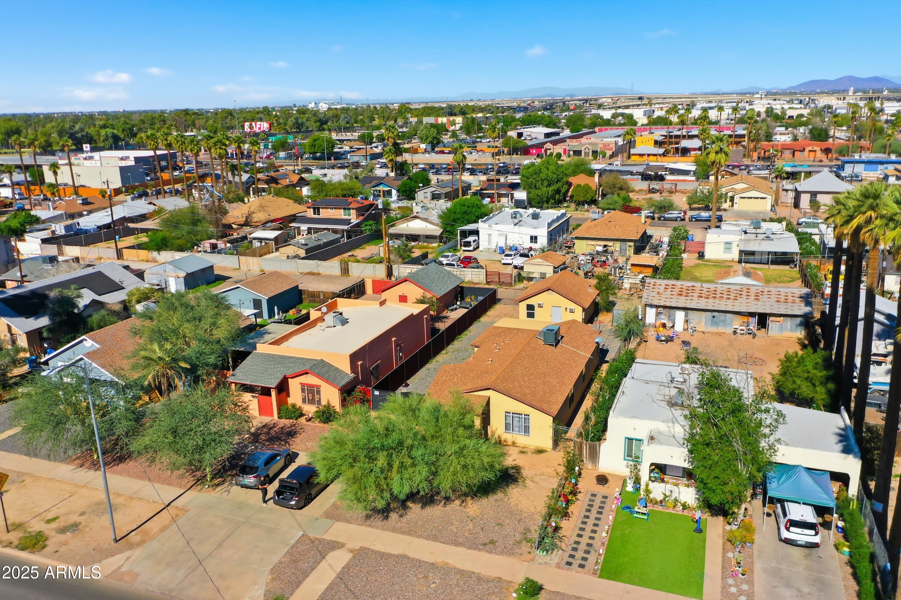 2118 West Adams Street Phoenix, AZ 85009 - Photo 48 of 48 an aerial view of a houses with a outdoor space