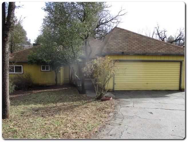 40367 Redbud Drive Oakhurst, CA 93644 - Photo 1 of 15 a view of a house