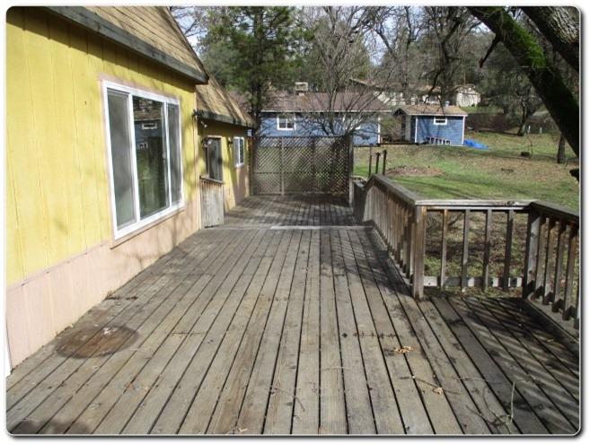 40367 Redbud Drive Oakhurst, CA 93644 - Photo 12 of 15 a view of outdoor space kitchen and deck