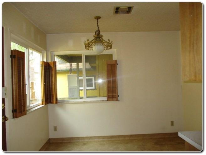 40367 Redbud Drive Oakhurst, CA 93644 - Photo 4 of 15 a view of a room with wooden floor and windows