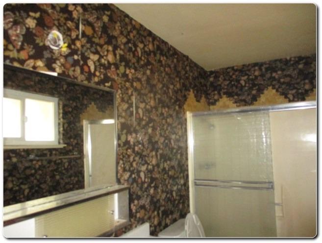 40367 Redbud Drive Oakhurst, CA 93644 - Photo 8 of 15 a bathroom with a glass shower door