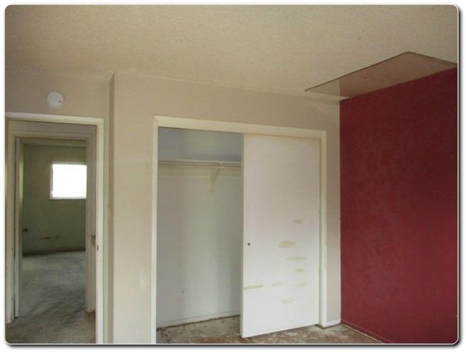 40367 Redbud Drive Oakhurst, CA 93644 - Photo 9 of 15 a view of a hallway with wooden shelves