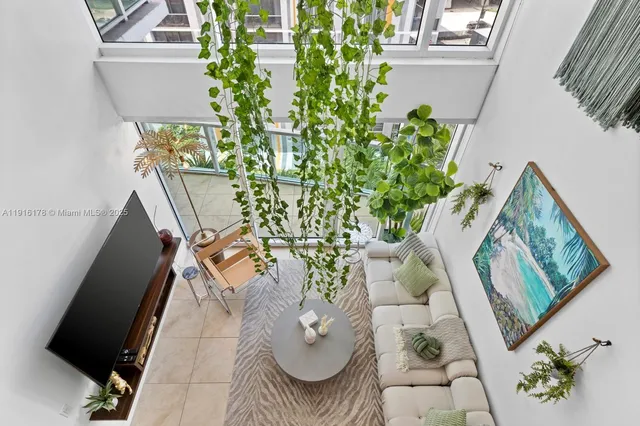 wooden floor with table and chairs