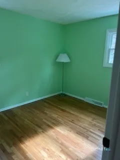 a view of a room with a fan