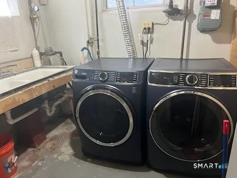 a utility room with dryer and washer