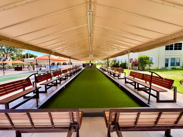 a view of a swimming pool with a patio