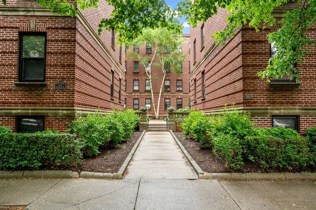 a view of a pathway both side of house