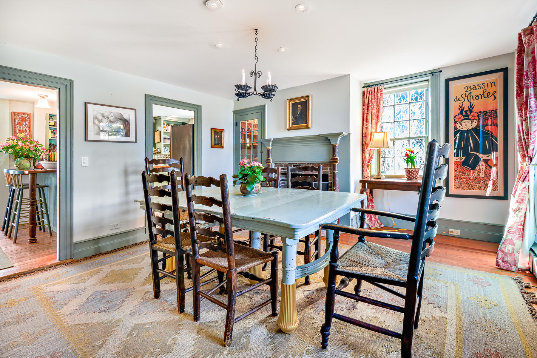 24 Old County Road Truro, MA 02666 - Photo 13 of 42 a view of a dining room with furniture wooden floor and a chandelier