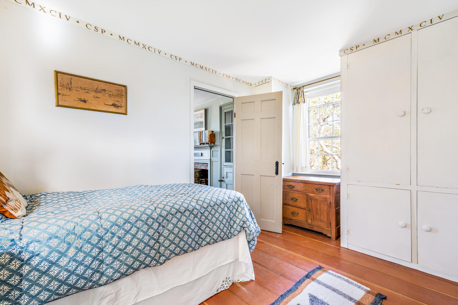 24 Old County Road Truro, MA 02666 - Photo 24 of 42 a bedroom with a bed and a window