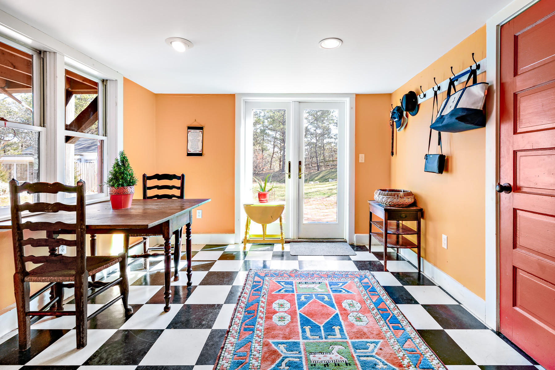 24 Old County Road Truro, MA 02666 - Photo 29 of 42 a very nice looking room with many windows and a rug