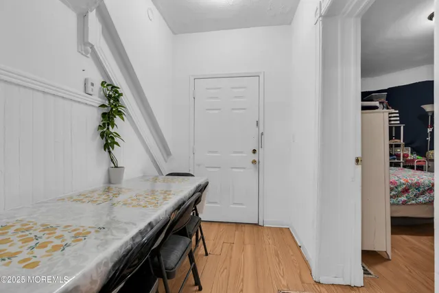 a view of kitchen island with wooden floor