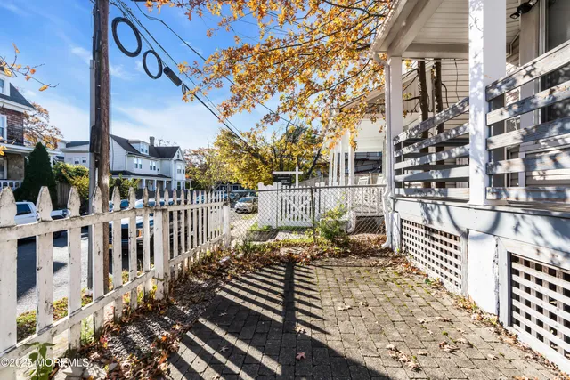 front view of a house with a small yard