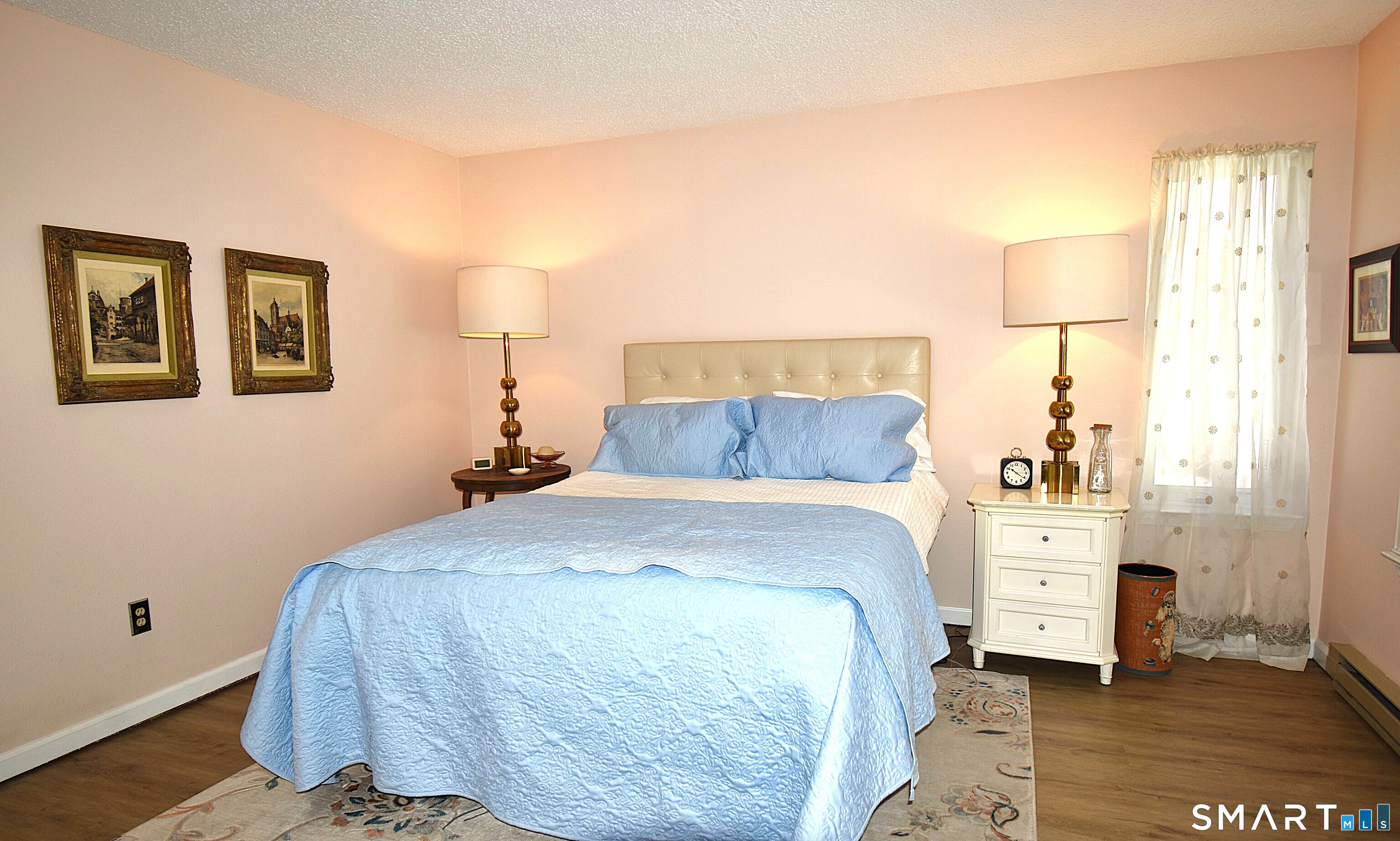 925 Oronoke Road, Unit 38A Waterbury, CT 06708 - Photo 20 of 29 a bedroom with a bed and a lamp