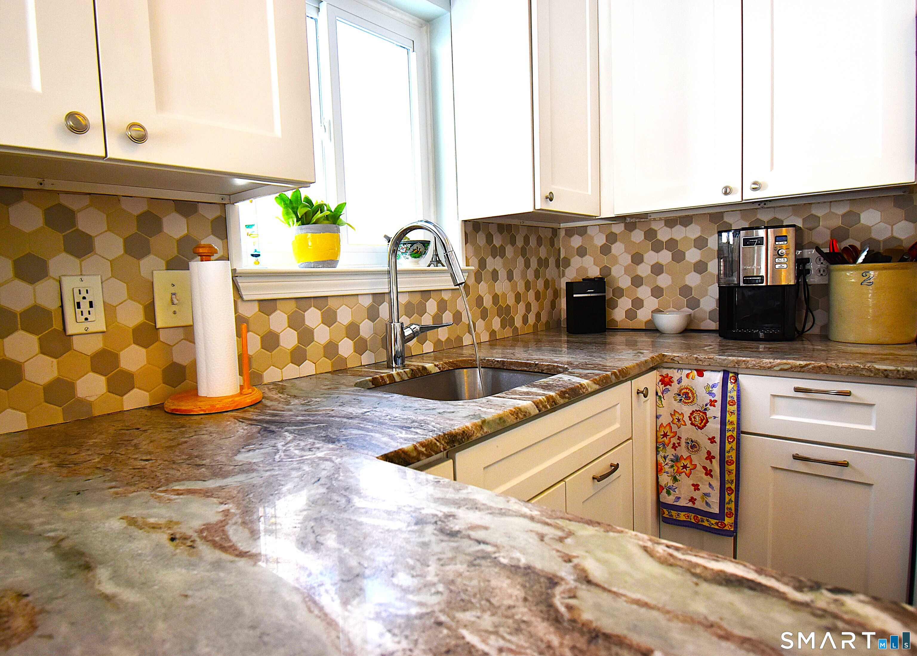 925 Oronoke Road, Unit 38A Waterbury, CT 06708 - Photo 6 of 29 a kitchen with stainless steel appliances granite countertop a sink and a stove