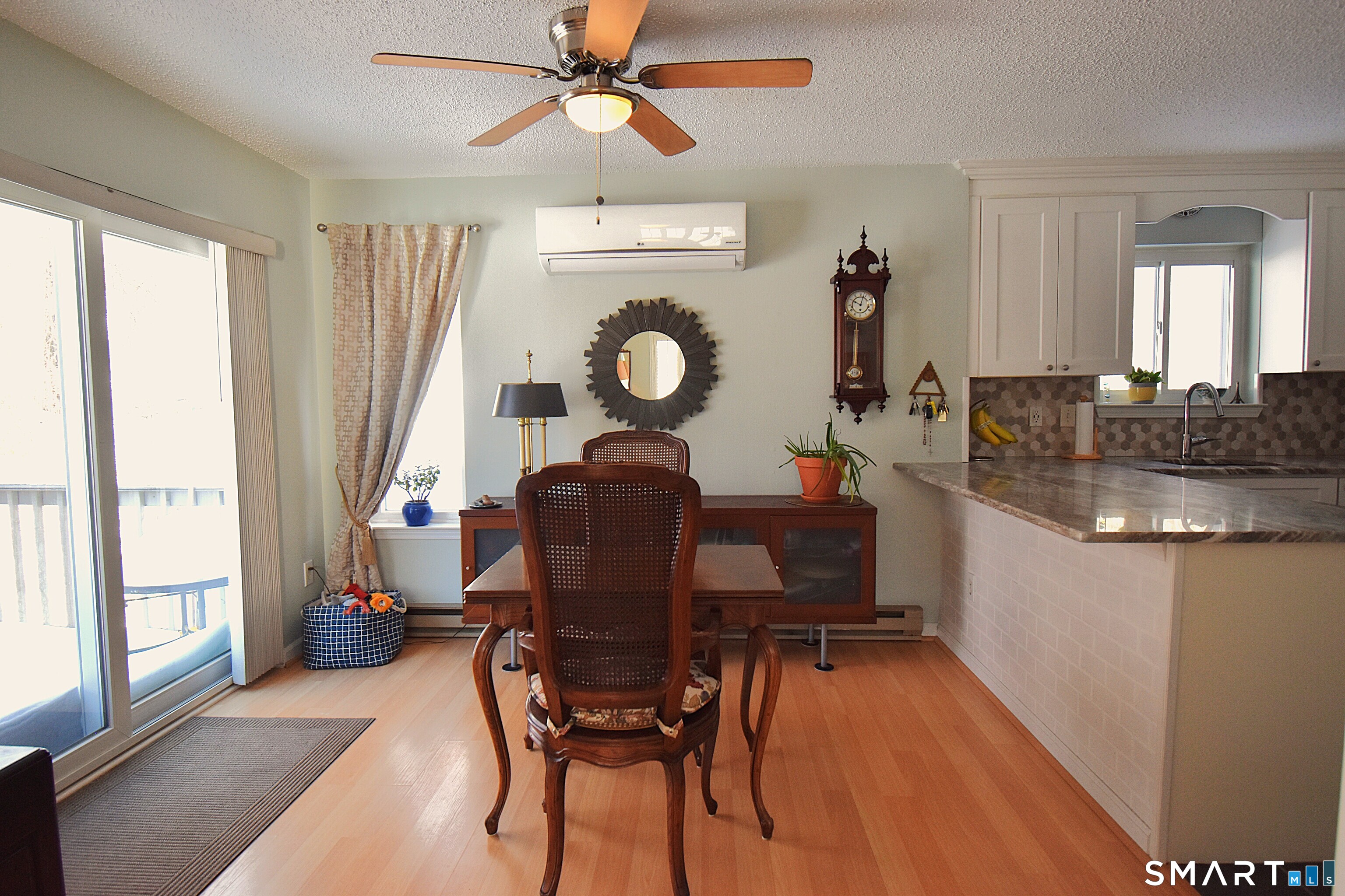 925 Oronoke Road, Unit 38A Waterbury, CT 06708 - Photo 8 of 29 a living room with furniture and a large window