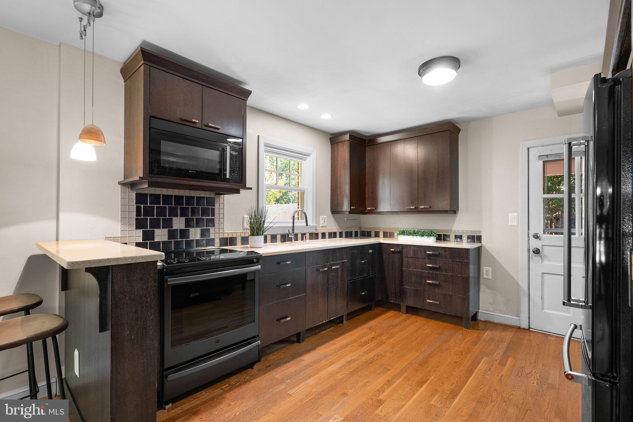 218 St Lawrence Drive Silver Spring, MD 20901 - Photo 17 of 63 Kitchen with custom wood cabinets
