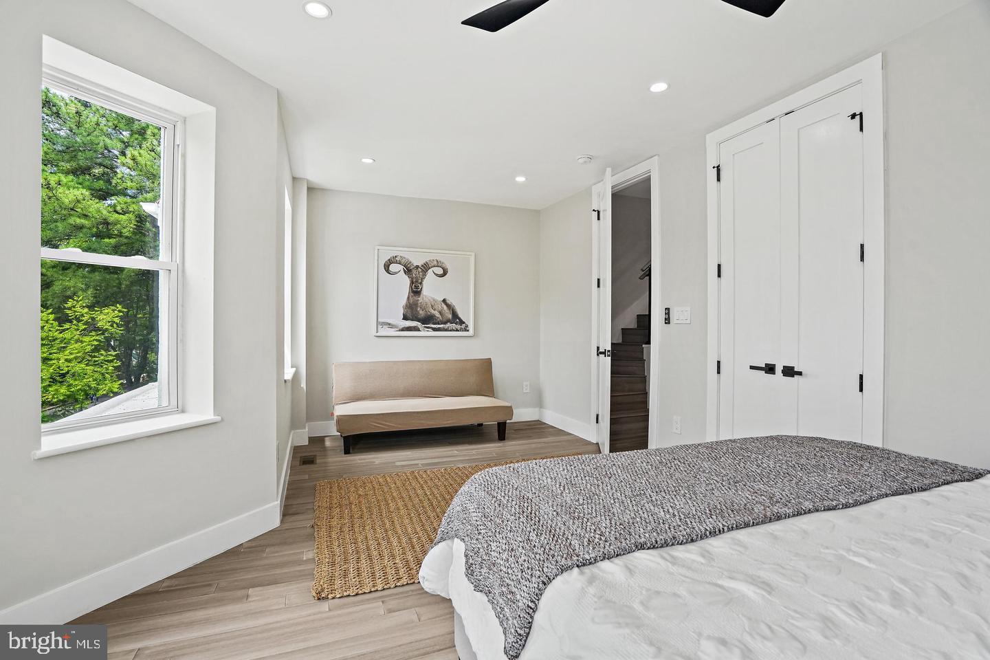 719 Quebec Place Northwest Washington, DC 20010 - Photo 20 of 32 Serene bedroom with natural light and style.