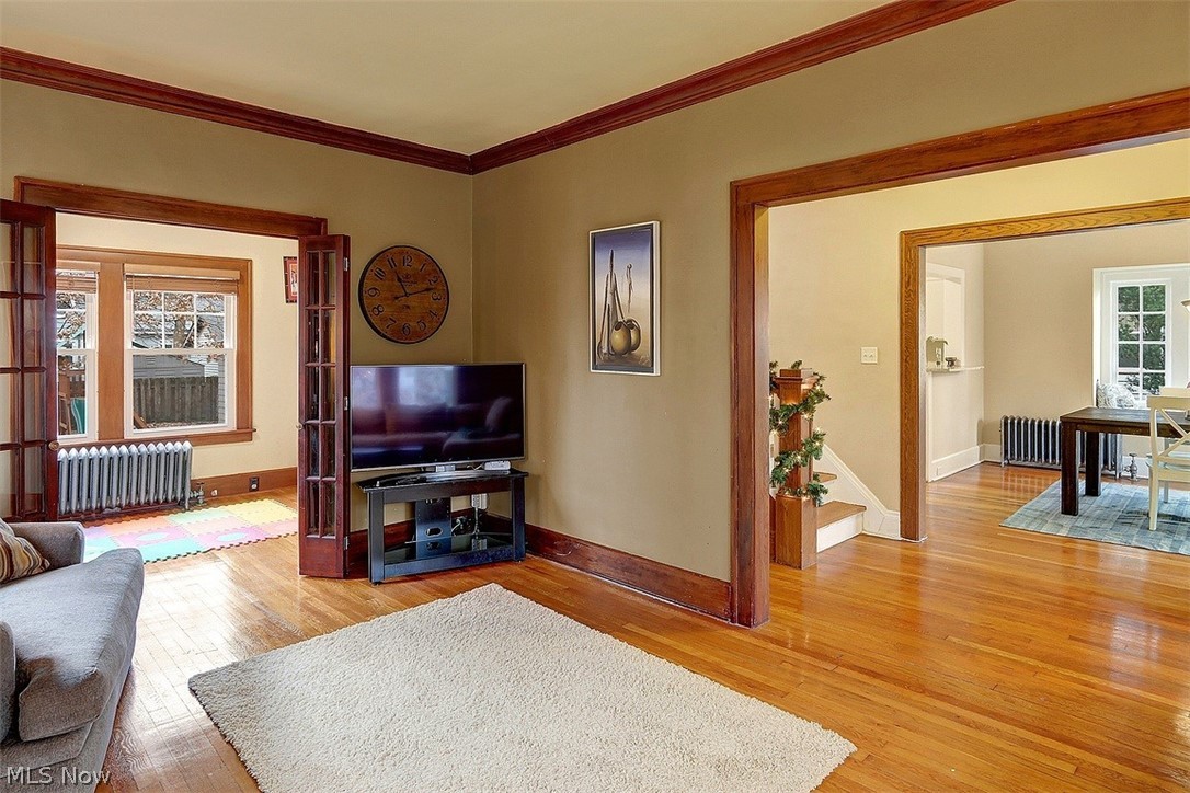 3041 Yorkshire Road Cleveland, OH 44118 - Photo 6 of 25 Classic center hall colonial with an extra room off the living room, separated by bi-fold French doors.