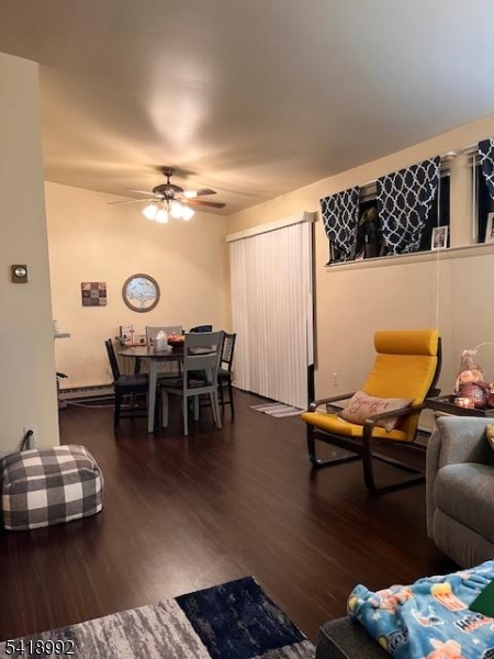 14 Crossway Clinton, NJ 08809 - Photo 3 of 6 a living room with furniture and wooden floor